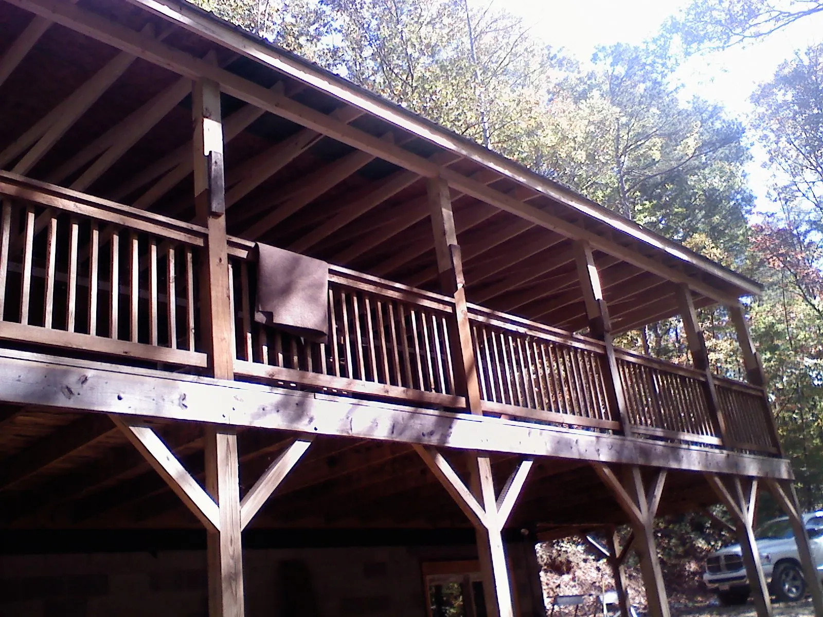 Timber framing under a new elevated porch and deck — Roof Leak Repair in Higden by Roofing Brothers
